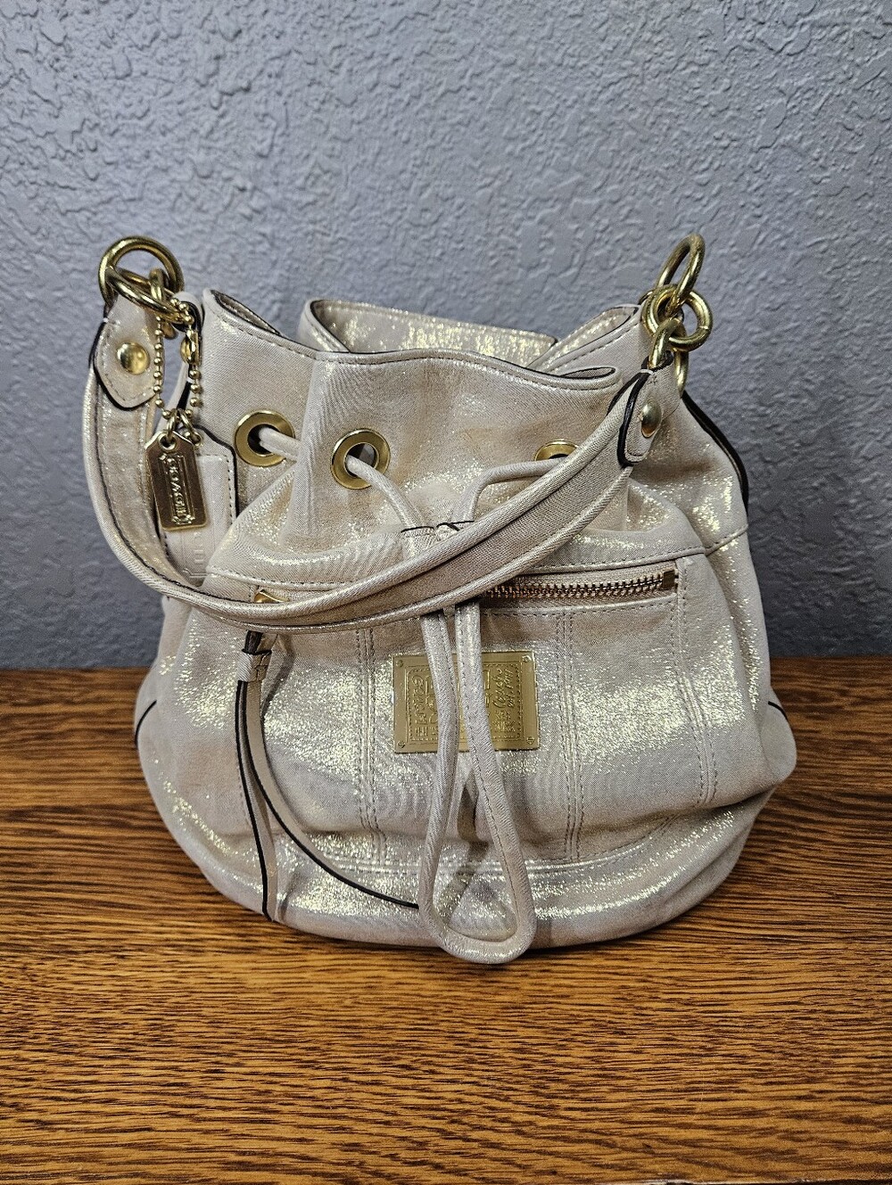 Coach Poppy Gold Shimmer Cinch Bucket Bag